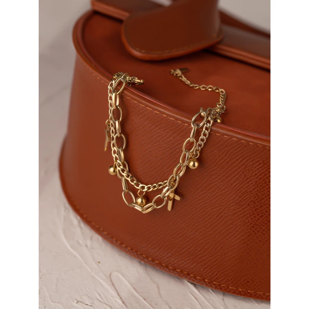 Pulseira Dupla Cruz e Esferas